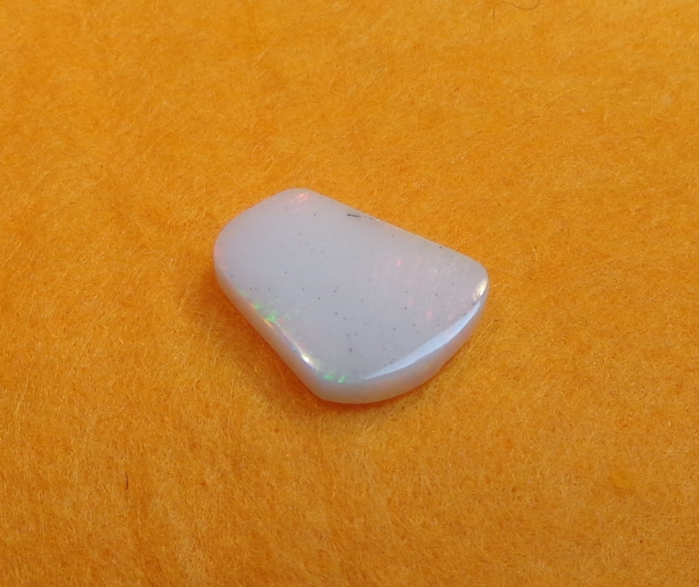 Spencer Idaho Opal Solid 9X15 mm with Unique Pattern and Red, Green, & Gold Fire