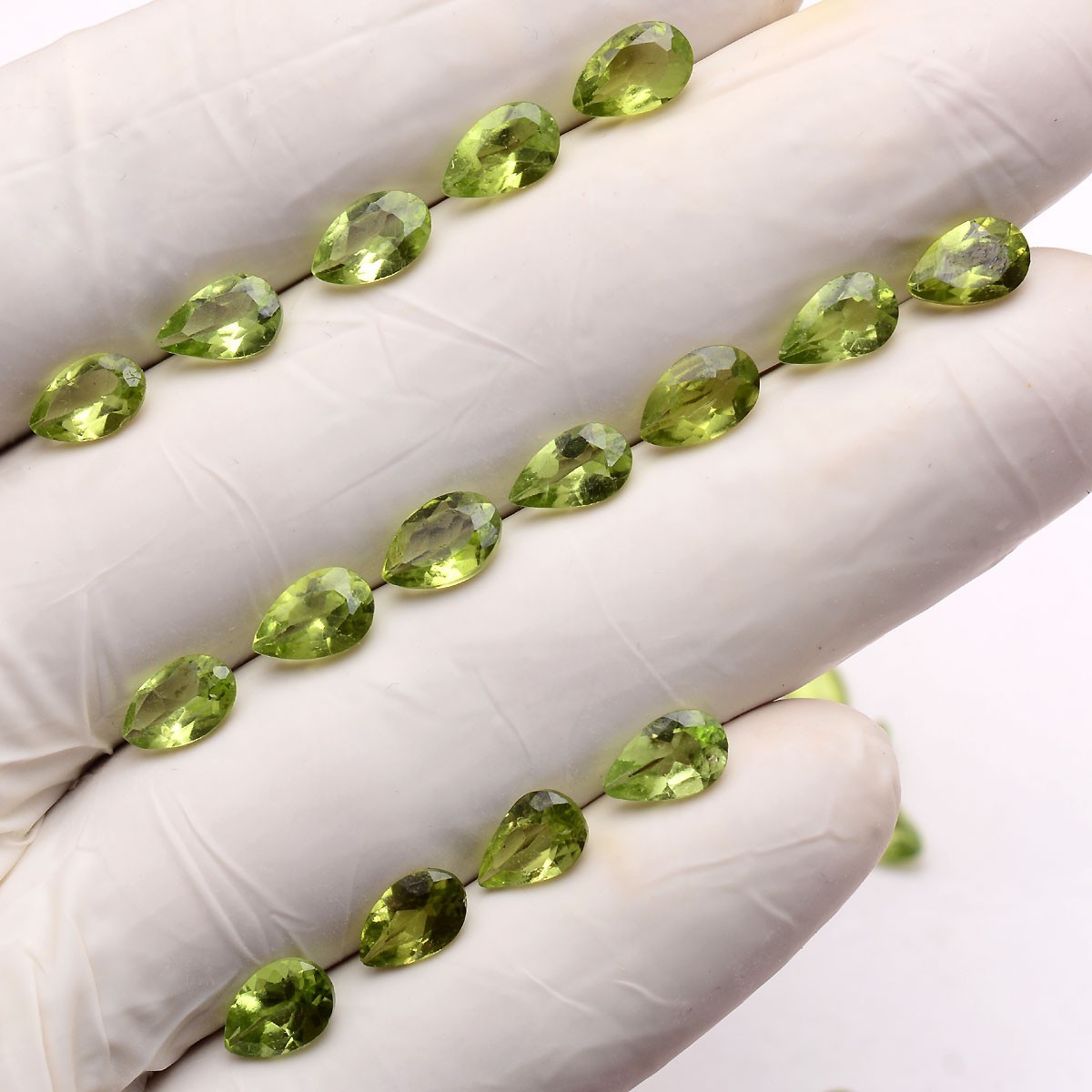 32 Pcs VVS Natural Peridot 7.74mm-8.20mm Pear Cut Stunning Untreated Gemstones