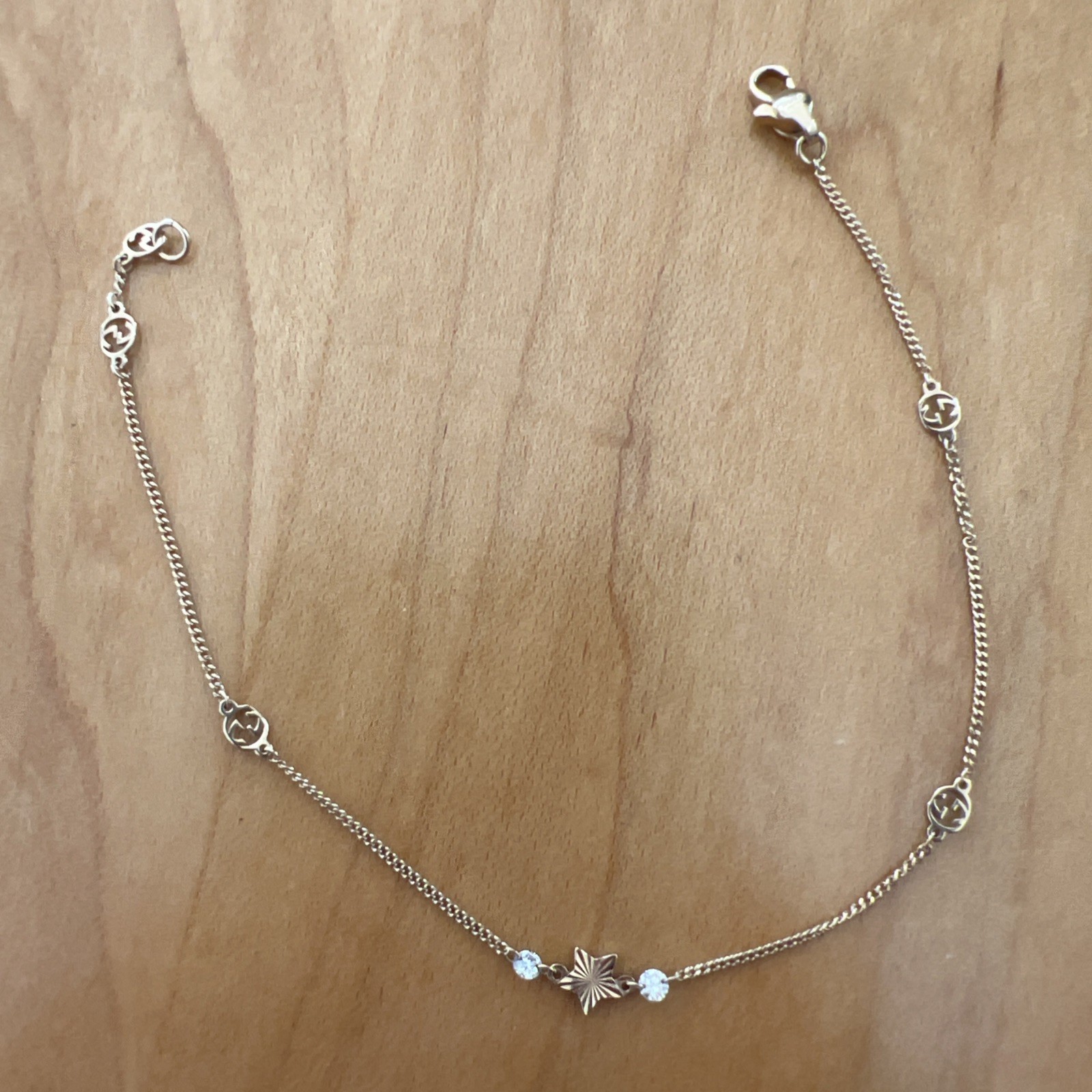Gucci 18k Yellow Gold Star Interlocking G Diamond Bracelet. Retails for $2000