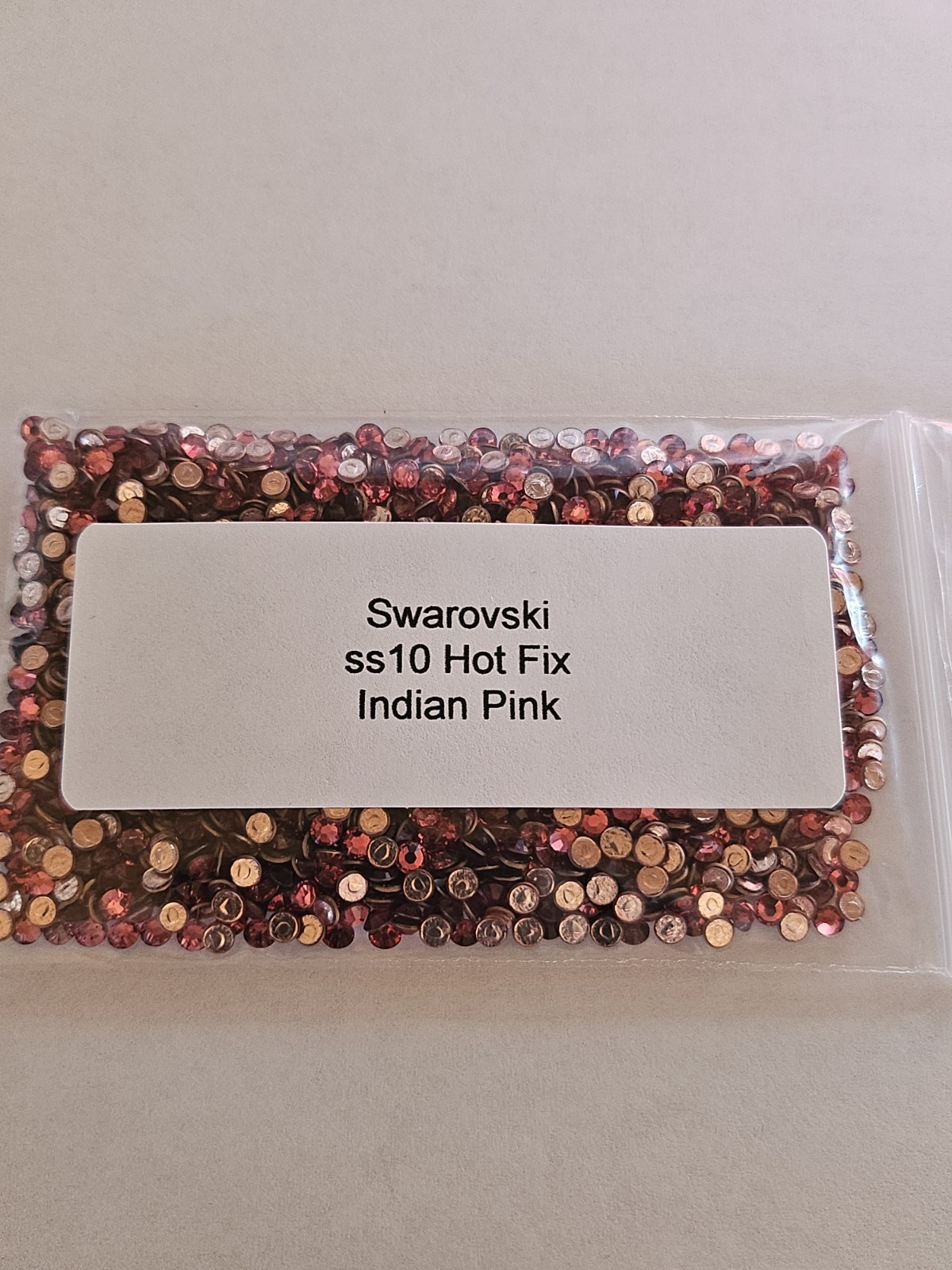 Genuine Swarovski ss10 Hot Fix Crystals in the color LIGHT COLORADO TOPAZ