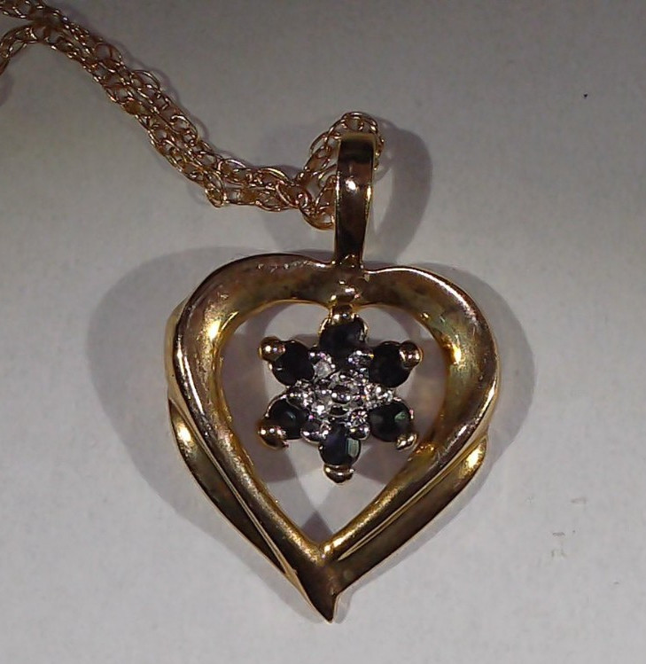 Vtg 10K Yellow Gold Genuine Blue Sapphires in an Open Heart Pendant Necklace