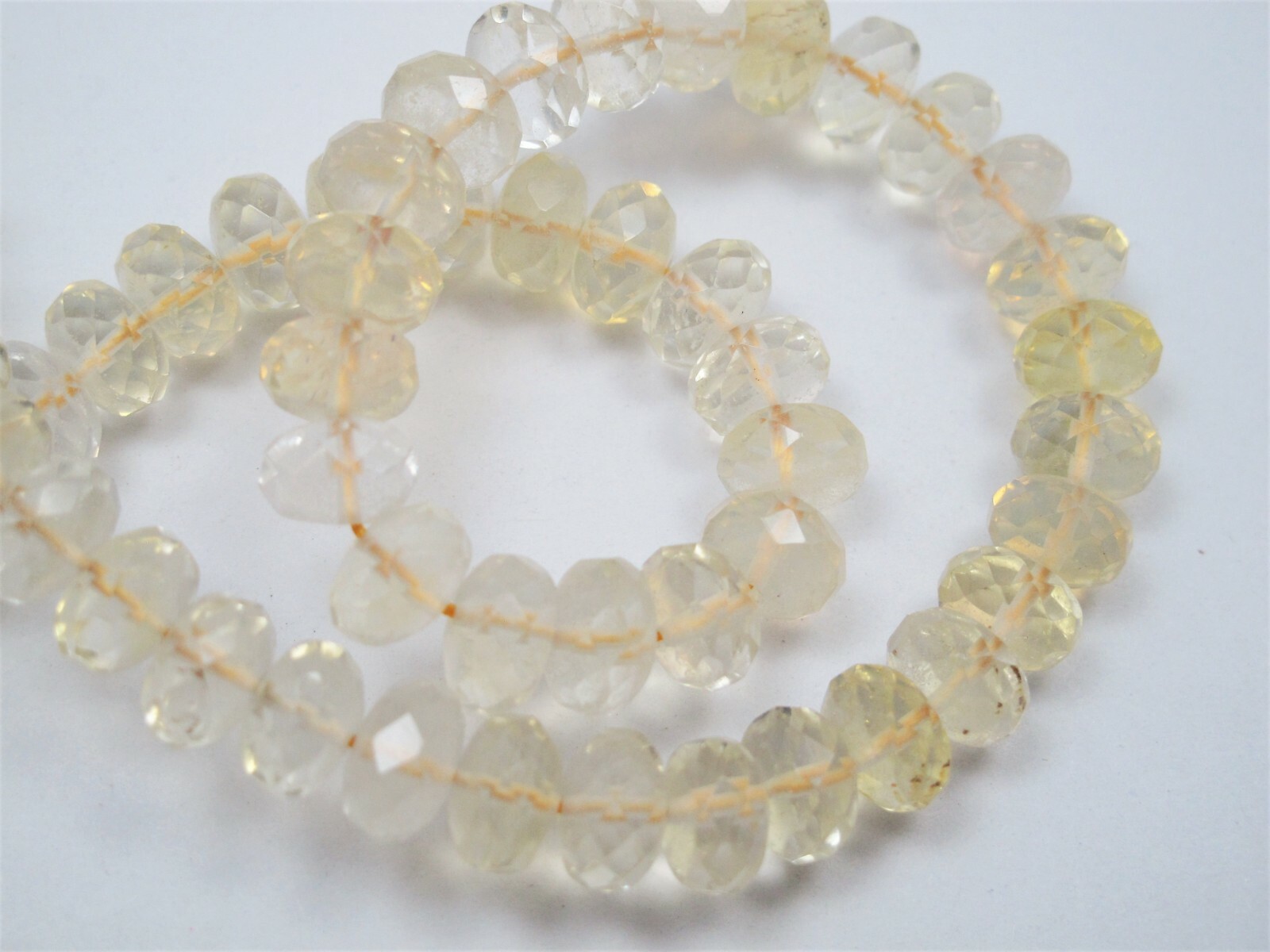 Pineapple quartz faceted roundell beads. 8mm,10mm Light yellow quartz beads.