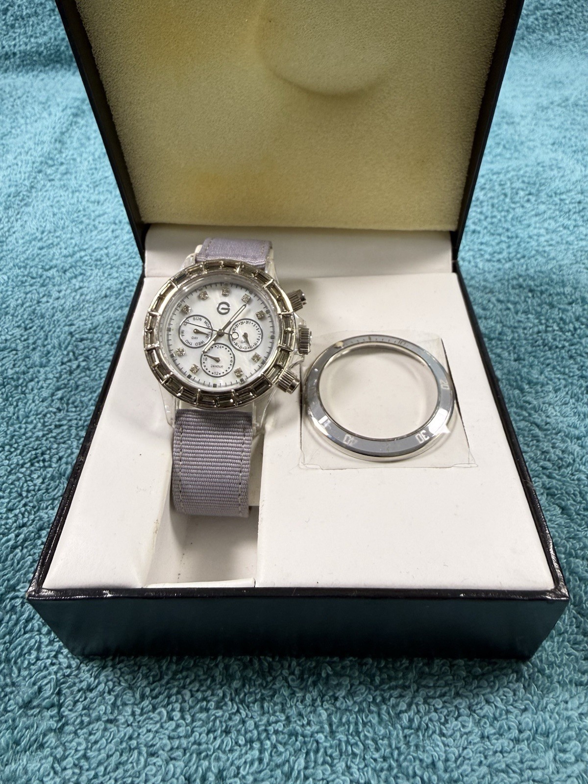 Gossip Gray Dial Bezel Crystal Accent Round Clear Case Gray Canvas Band Watch