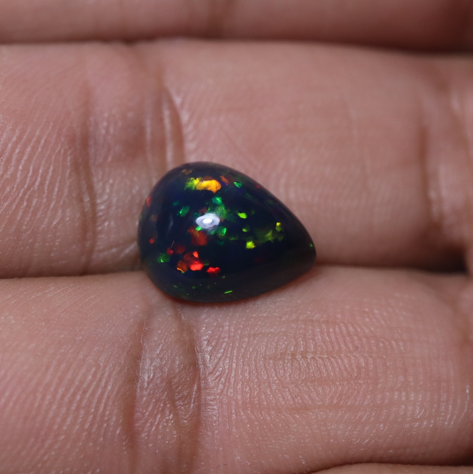 4.6Ct 13.2×10.6 MM Real AAA Multi Fire Smoked Black Ethiopian Opal Pear Cabochon