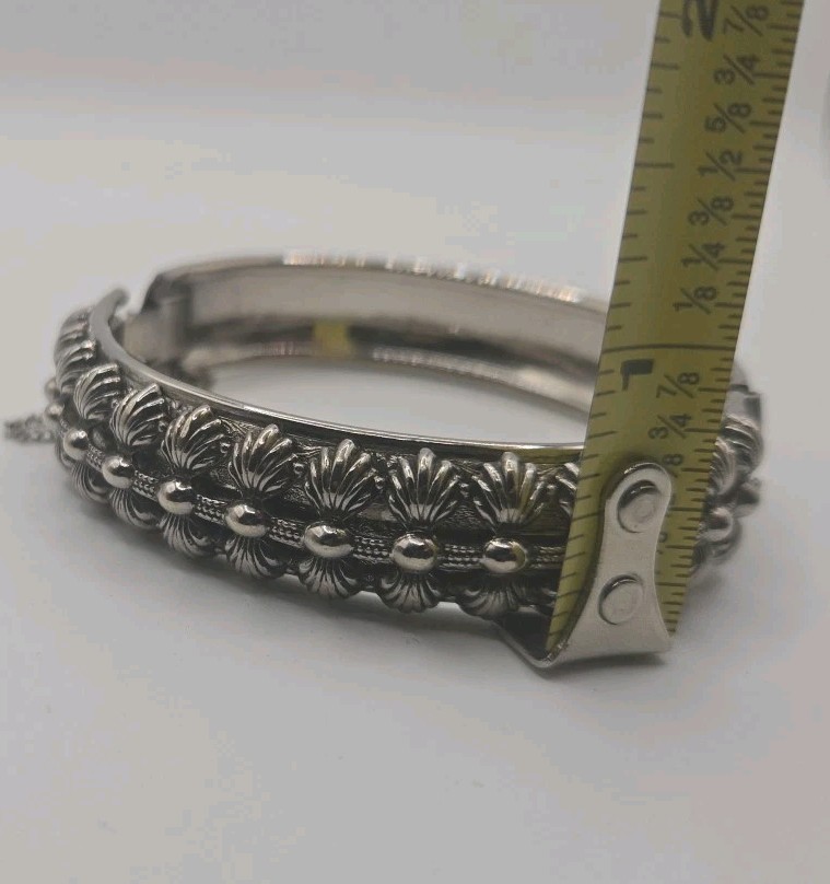 Silver Tone Hinged Bangle Bracelet Ornate And Embossed With Safety Chain 8″