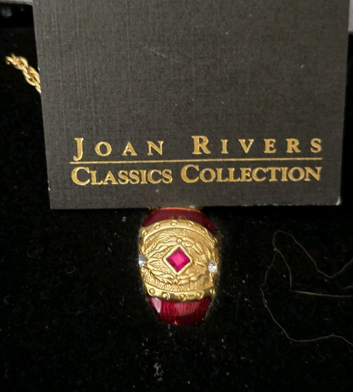 Beautiful Joan Rivers Red/Burgundy enamel egg Pedant With Chain. NIB