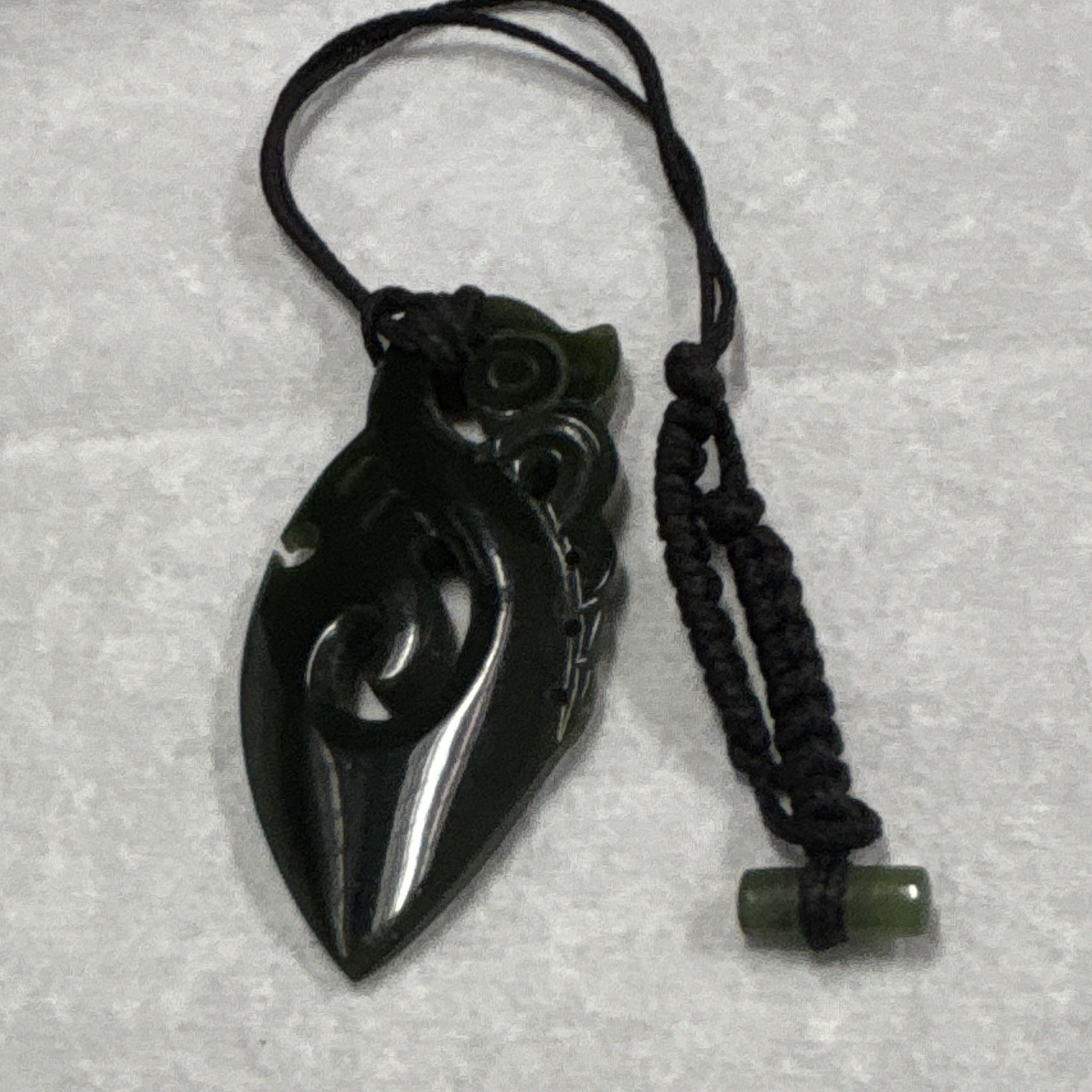 traditional New Zealand Maori pendant,Manaia design, a spiritual guardian figure