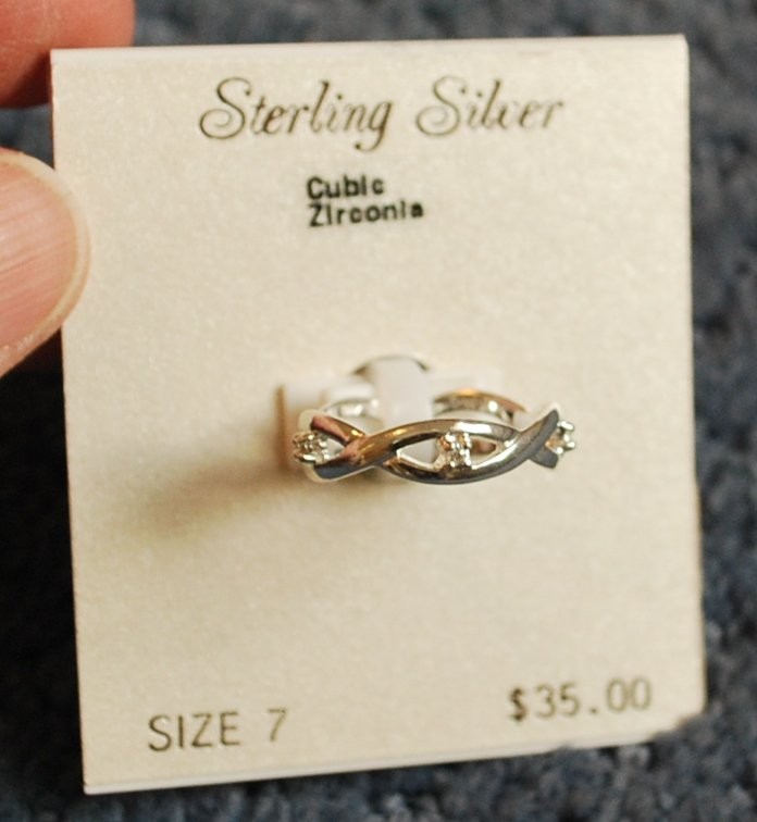 NWT – Sterling Silver Cubic Zirconia ring (size 7) weave design – MSRP $35