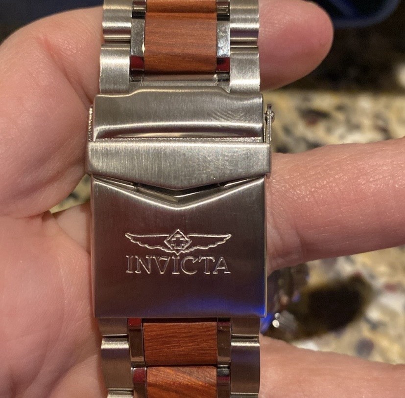 Invicta Pro Diver men’s quartz watch with a wood grain dial model 0164.