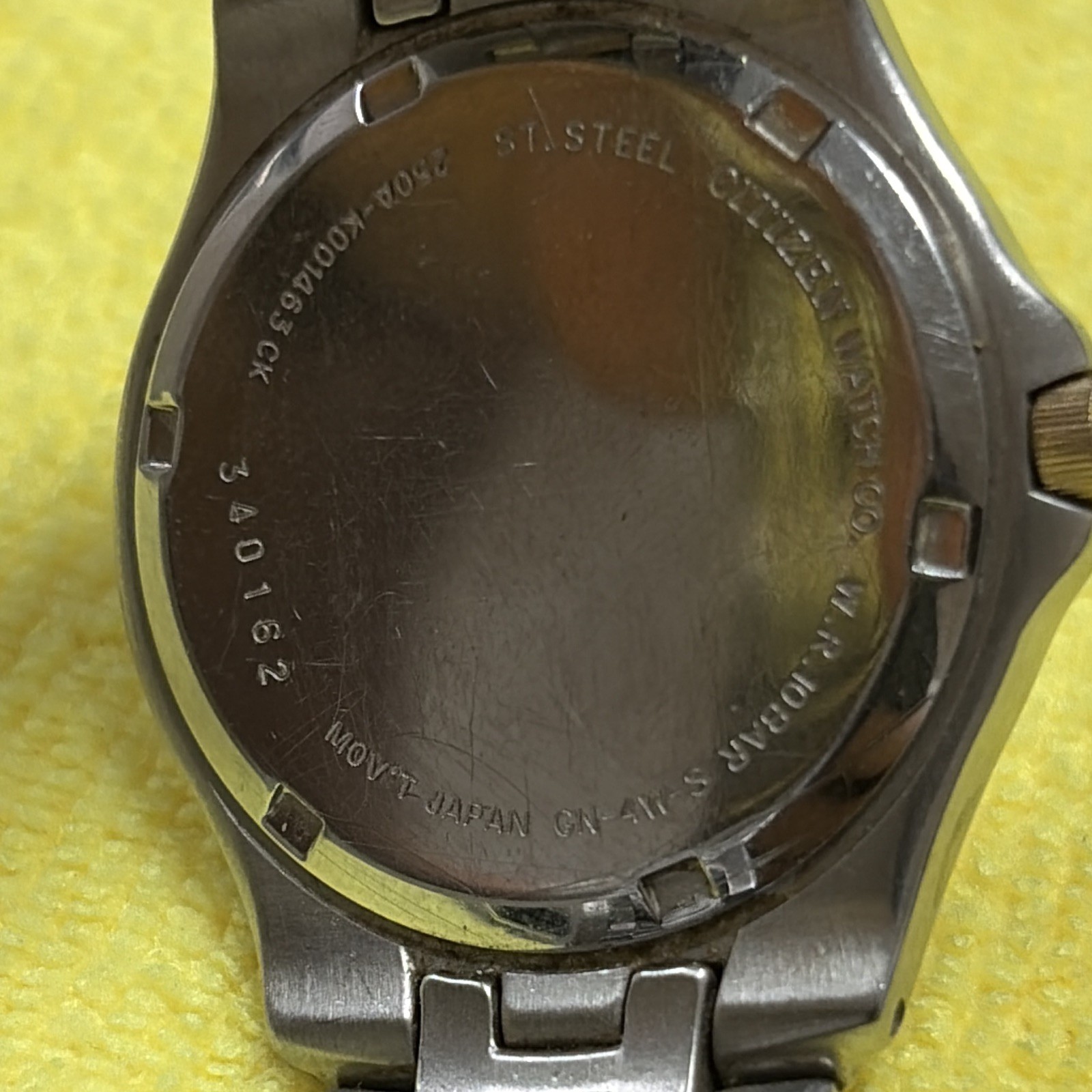 Citizen Quartz Day/Date WR 100m Two-Tone Silver Sunburst Dial 34mm Bracelet