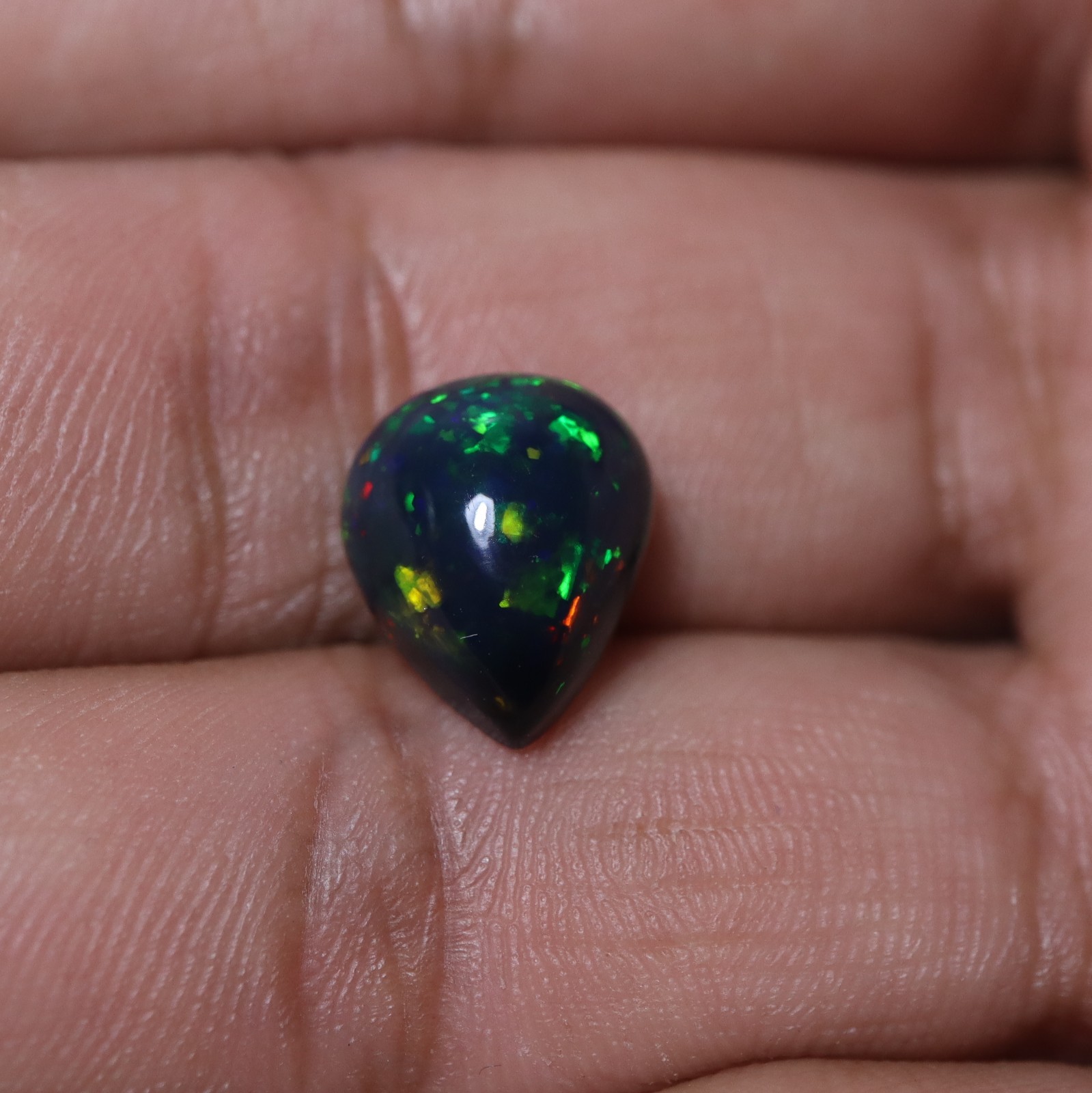 4.6Ct 13.2×10.6 MM Real AAA Multi Fire Smoked Black Ethiopian Opal Pear Cabochon