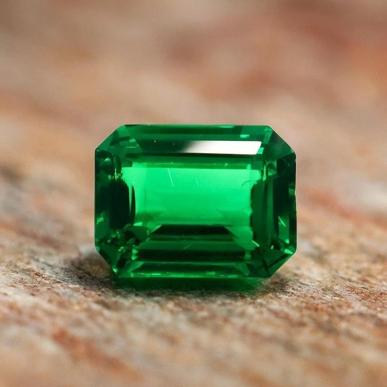 Flawless Natural 12.45 Ct Green Emerald GIE Certified Emerald Cut Loose Gemstone