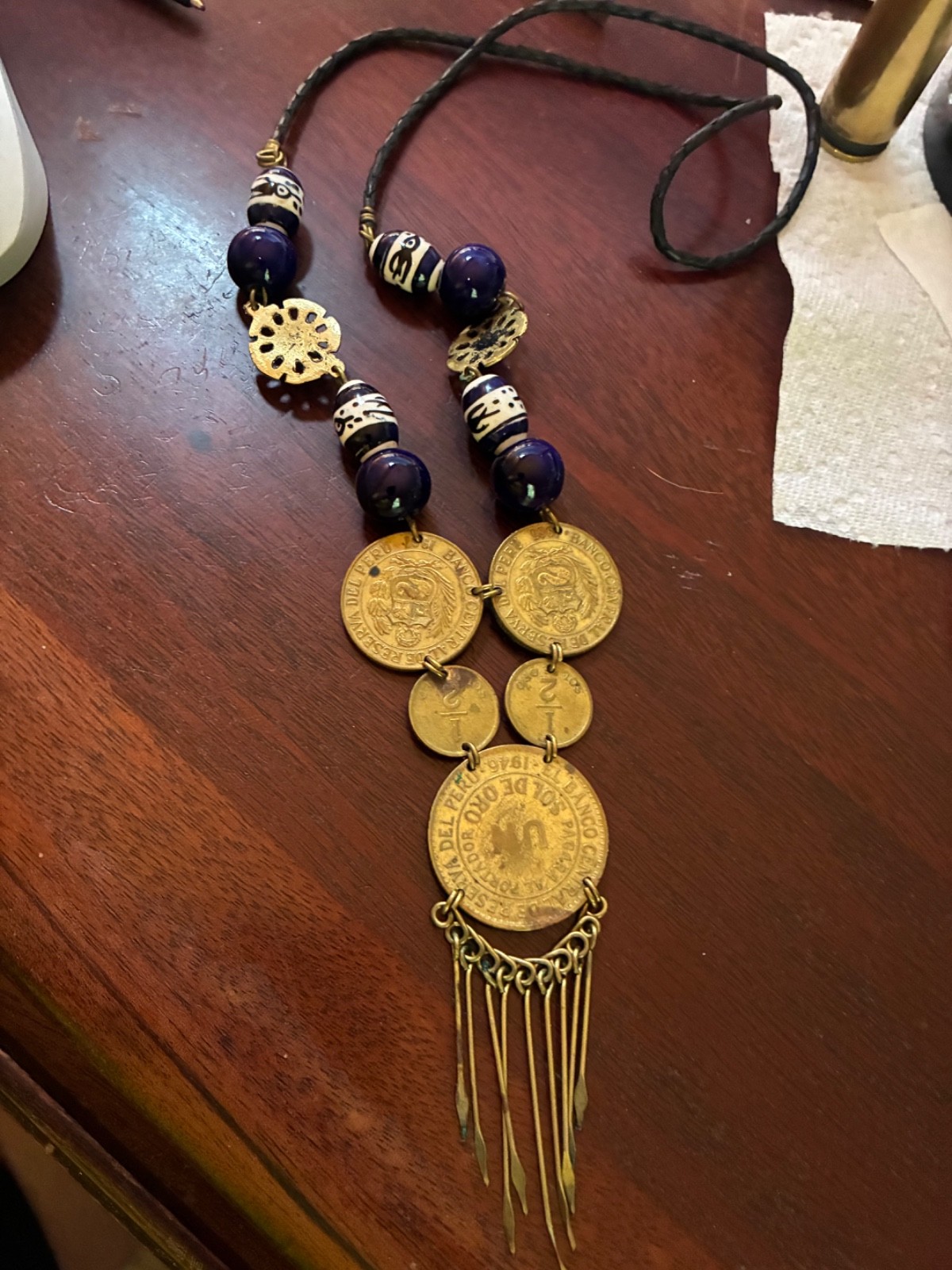 Peruvian necklace with 1946 and 1961 un sol de oro