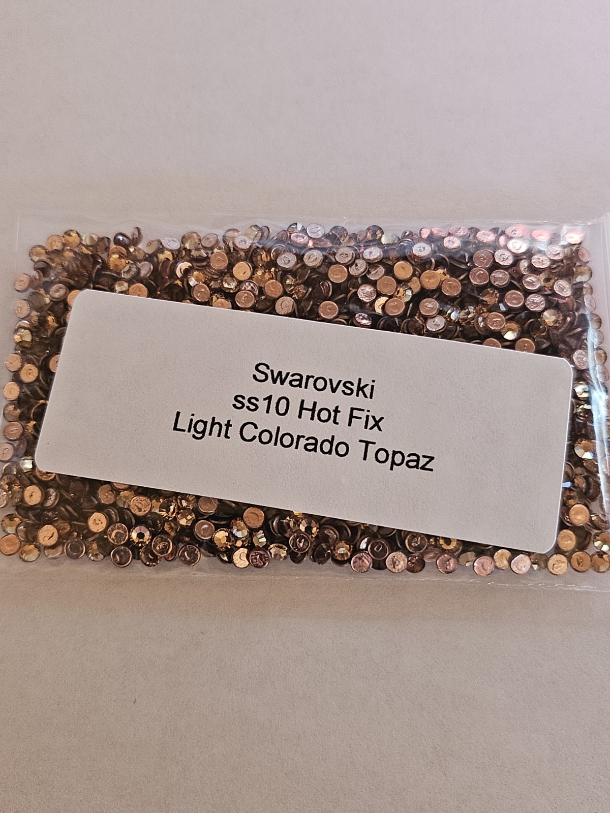 Genuine Swarovski ss10 Hot Fix Crystals in the color LIGHT COLORADO TOPAZ