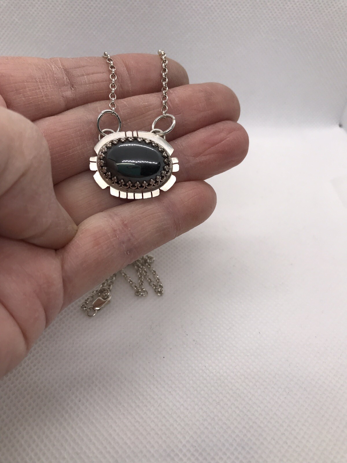 Hematite Pendant In Sterling Silver 18” Chain