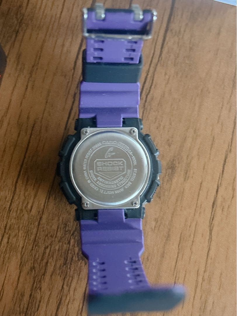 G SHOCK GA 100 1A purple camouflage