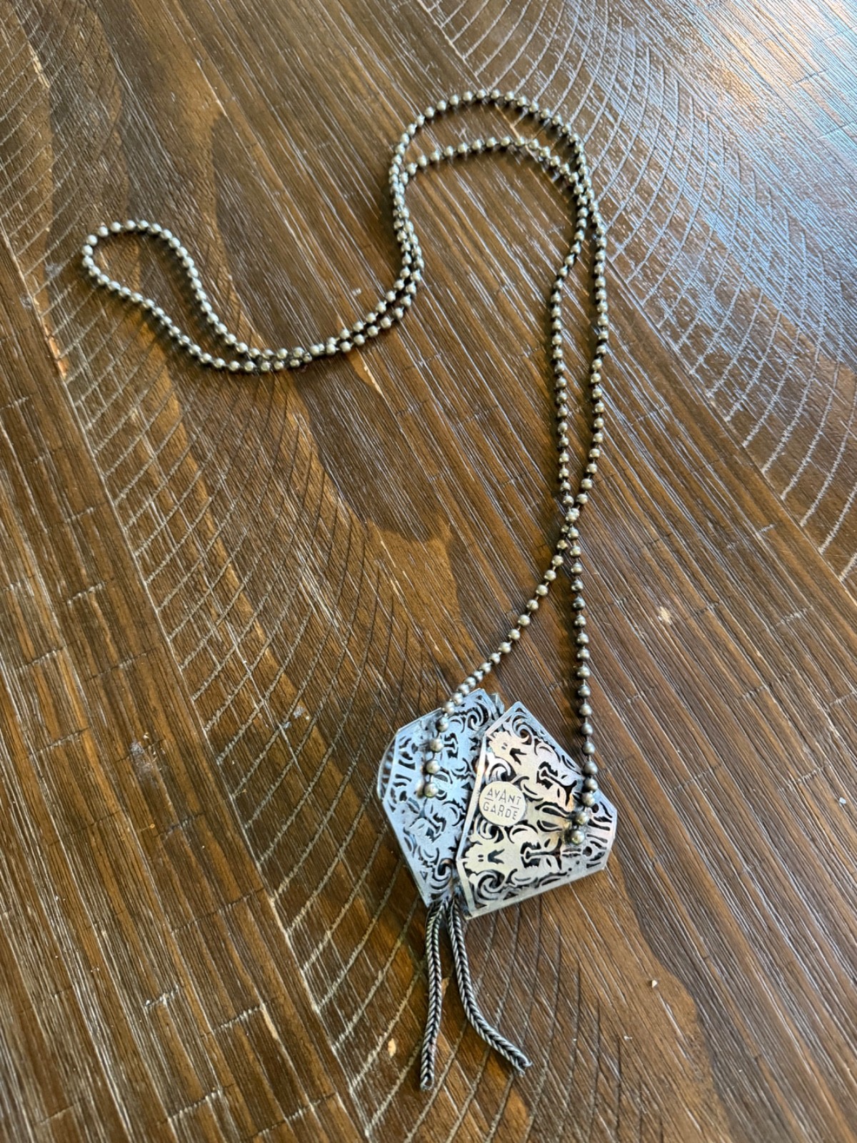 Avant Guard Long Filligree Silver toned Necklace with Crystal on Ball Chain