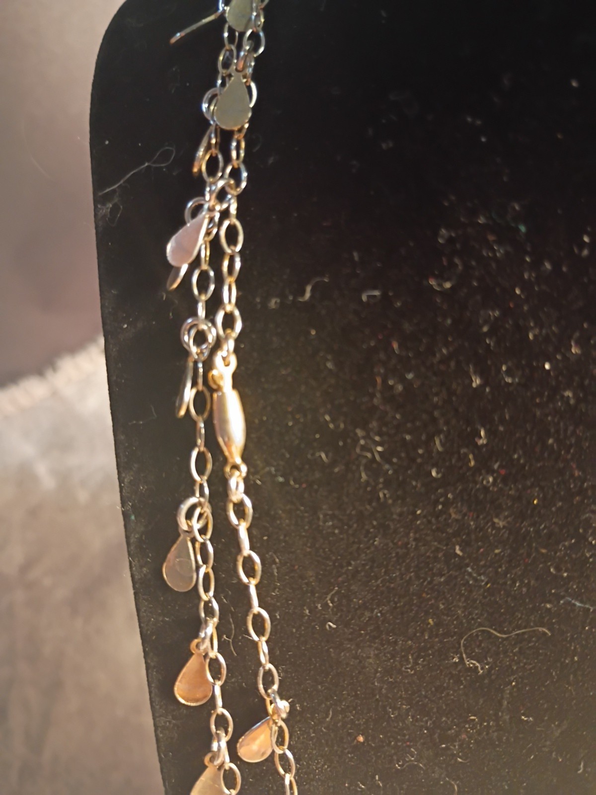 Gold Toned Tear Drop Charmed 56 Inch Taper Single Strand Necklace. J2
