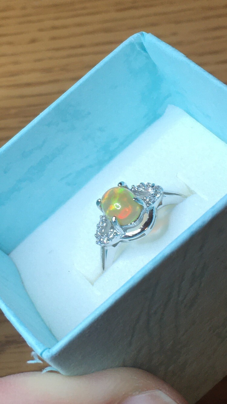#138B- 0.95ct Genuine Ethiopian Welo Opal set in a Size 8.5 Sterling Silver Ring