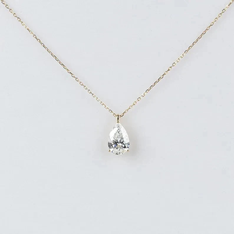 2CT Pear-Cut Moissanite Solitaire Pendant 14K Yellow Gold Plated 18″ Chain