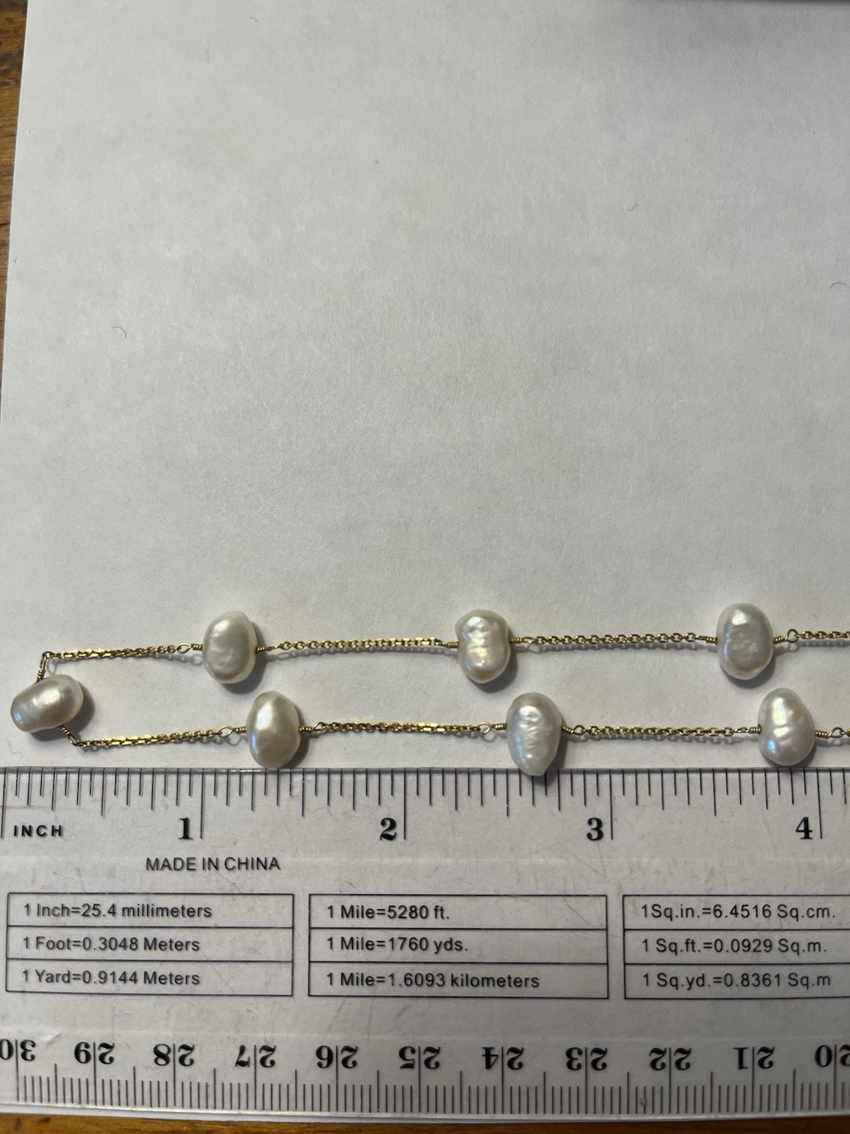 Stunning 14K gold 18″ pearl station necklace heavy 8.8 Grams.