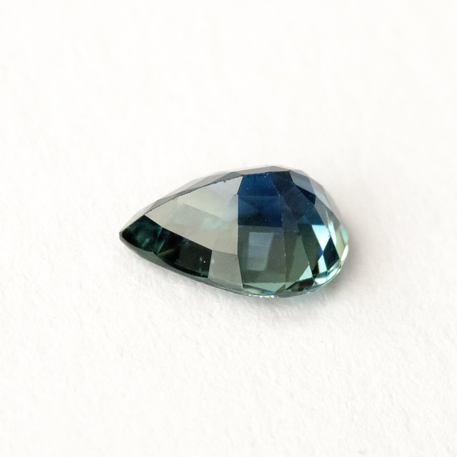 1.35ct Pear Shape Heated Natural Sapphire in Teal Green Peacock Blue Color