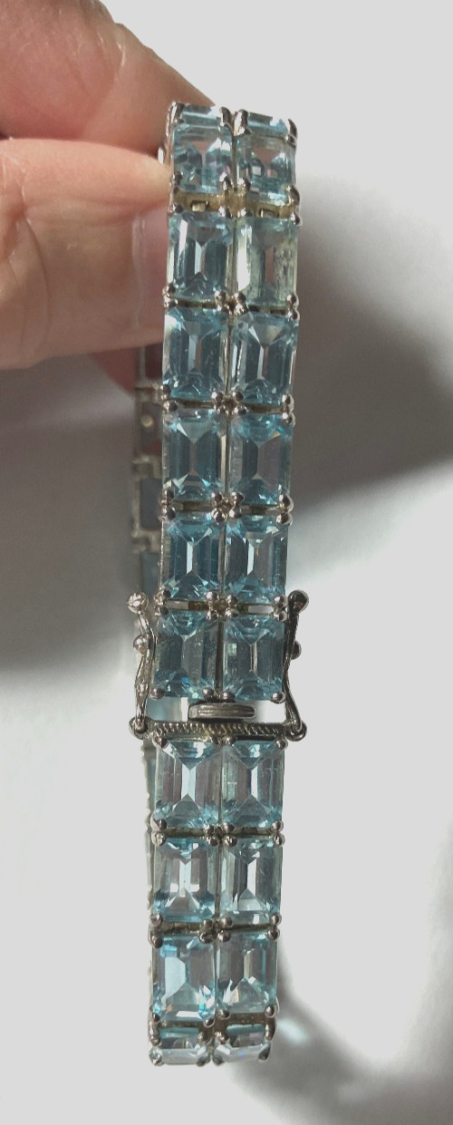 8” TENNIS BRACELET -ADI 925 STERLING SILVER – 40 EMERALD CUT TOPAZ STONES -NICE!