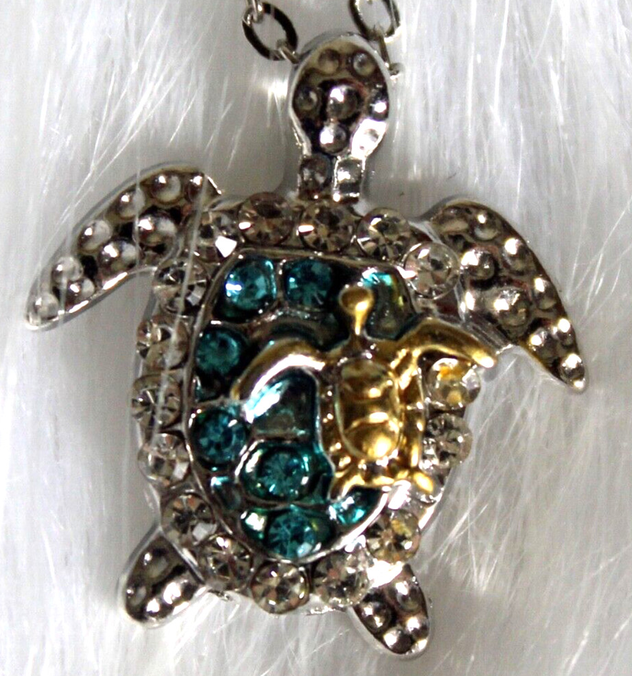Silver Sea Turtle with Blue Stones and a Gold on an 18″ Silver Chain Mom Baby