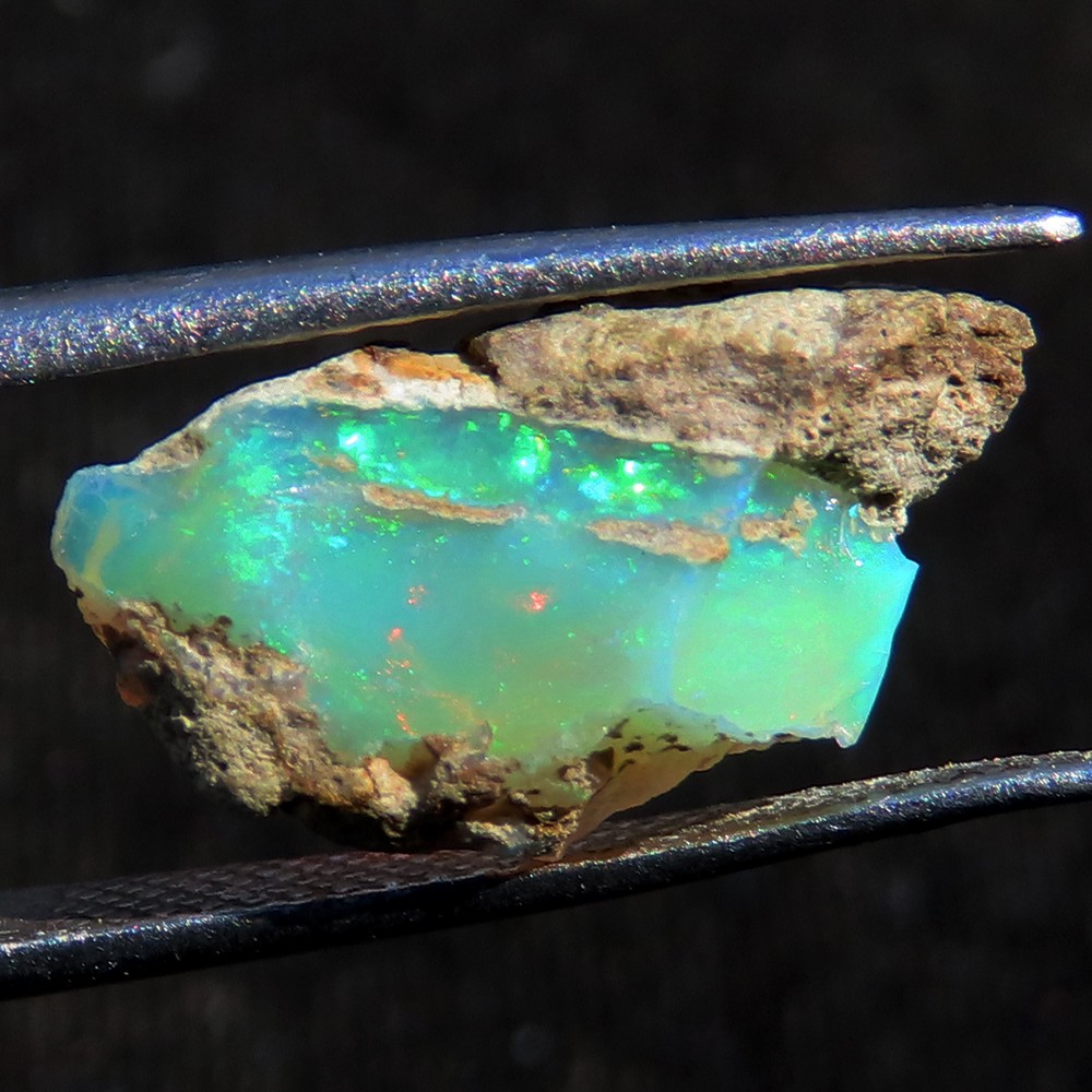 3.45 Carat. Genuine Play of MultiColor Ethiopian Opal Rough Gemstone 08x16x05 mm