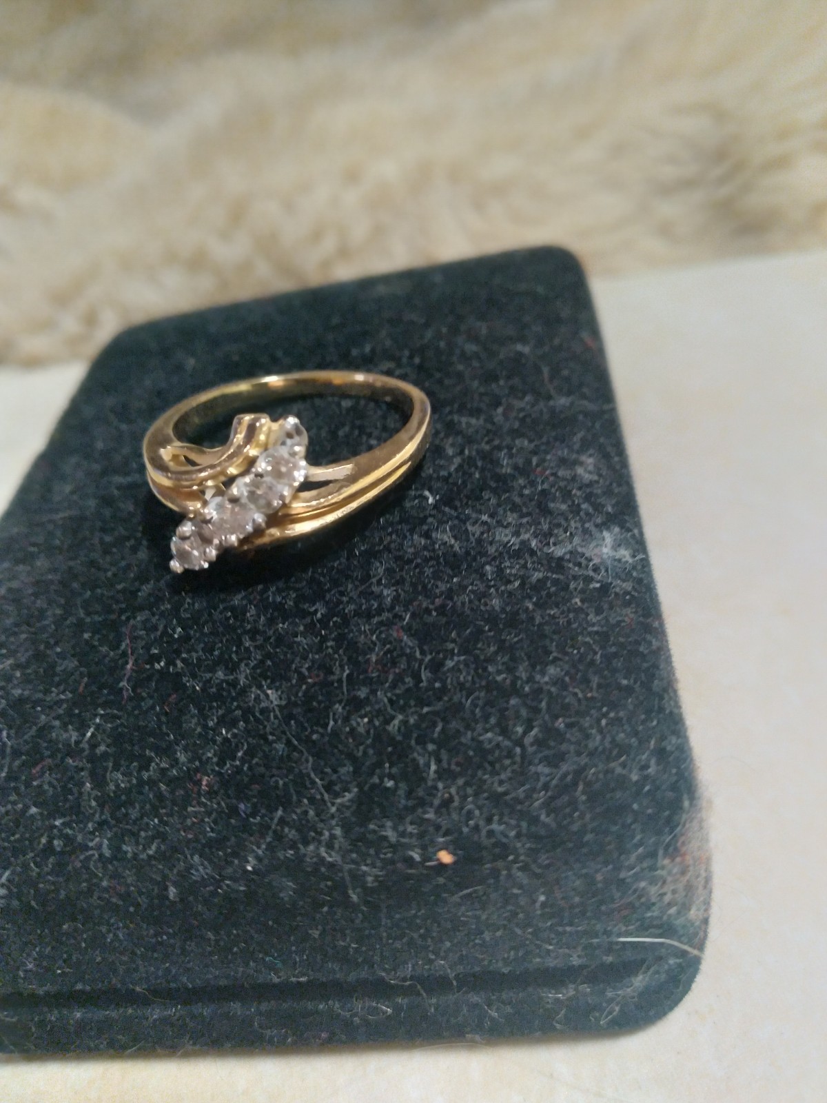 14K Yellow Gold Ring With A Cluster Of 5 Diamonds In A Bypass Design