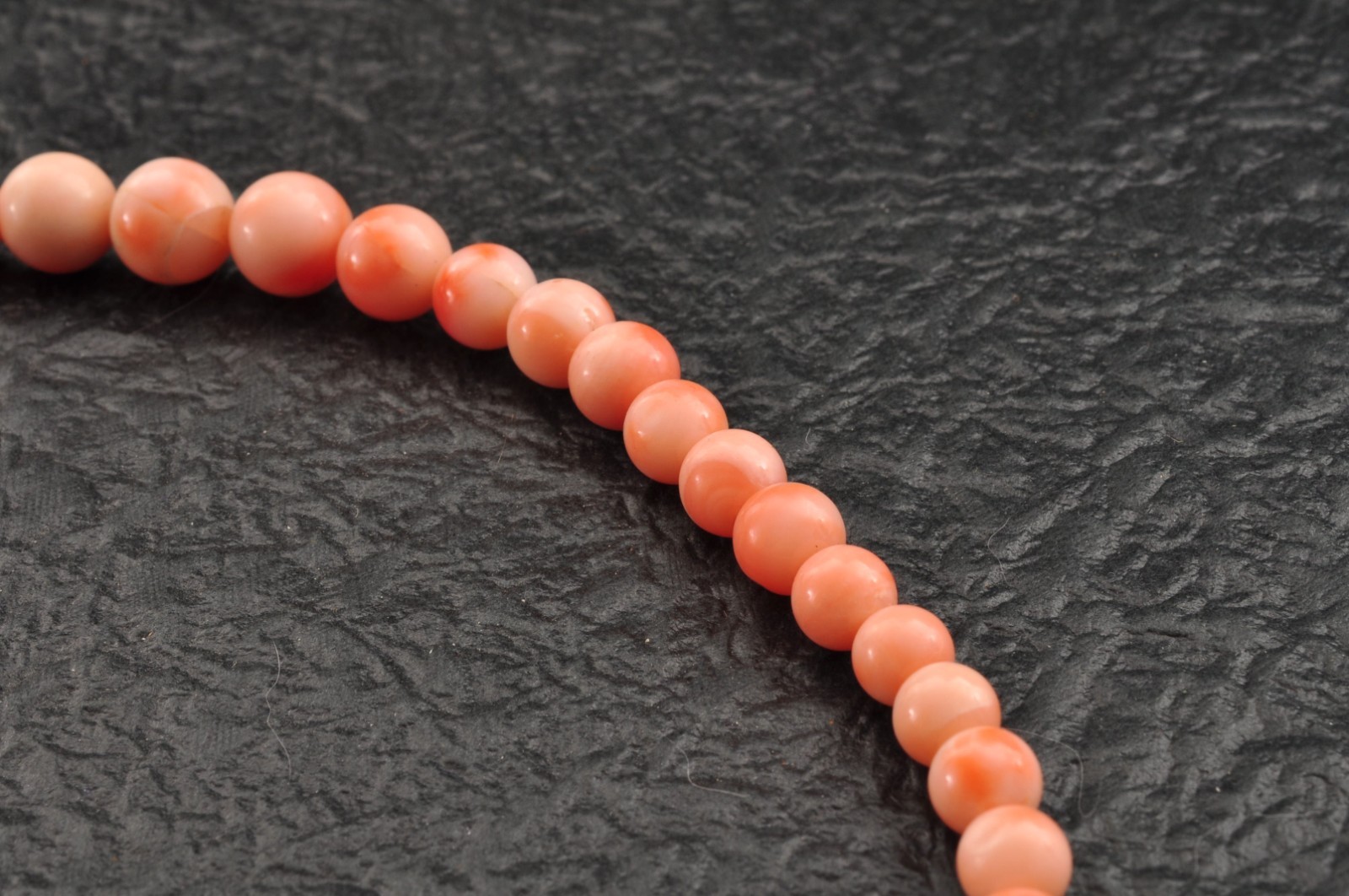 Salmon pink coral Necklace and ear clip set (total 116ct) with Certificate case.