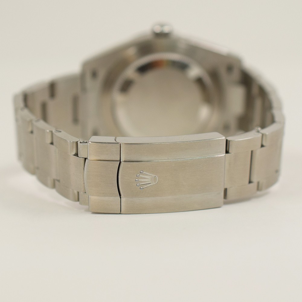 Rolex Oyster Perpetual 41 124300 Celebration Dial Steel Box & Papers Mint