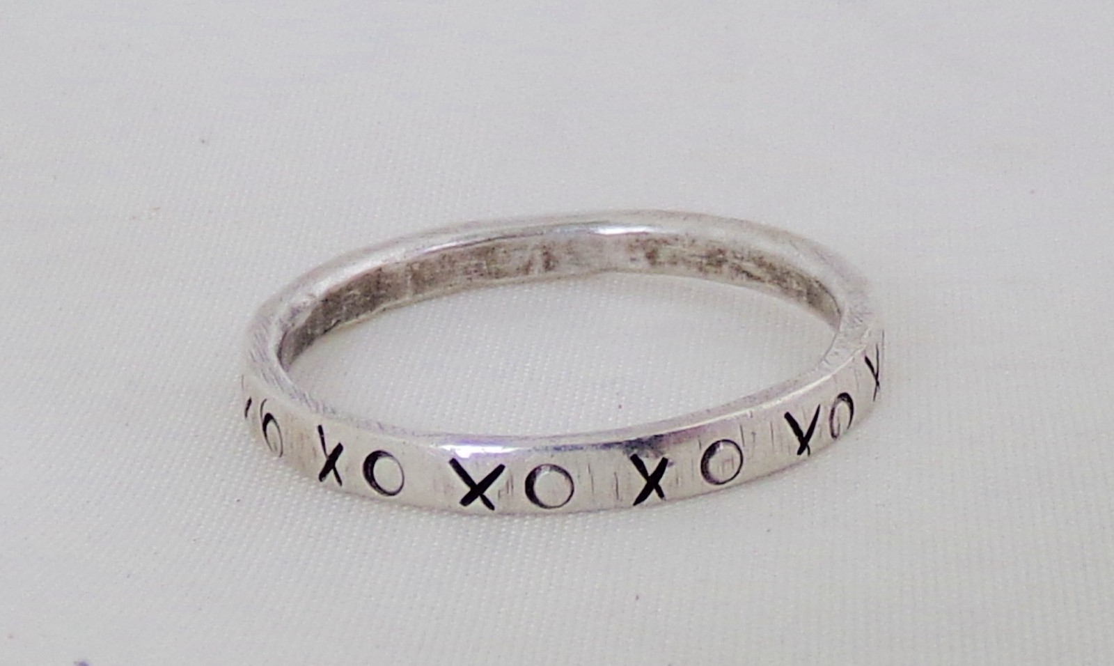 Sterling Silver with X’s & O’s Band- Size 6.5 Ring