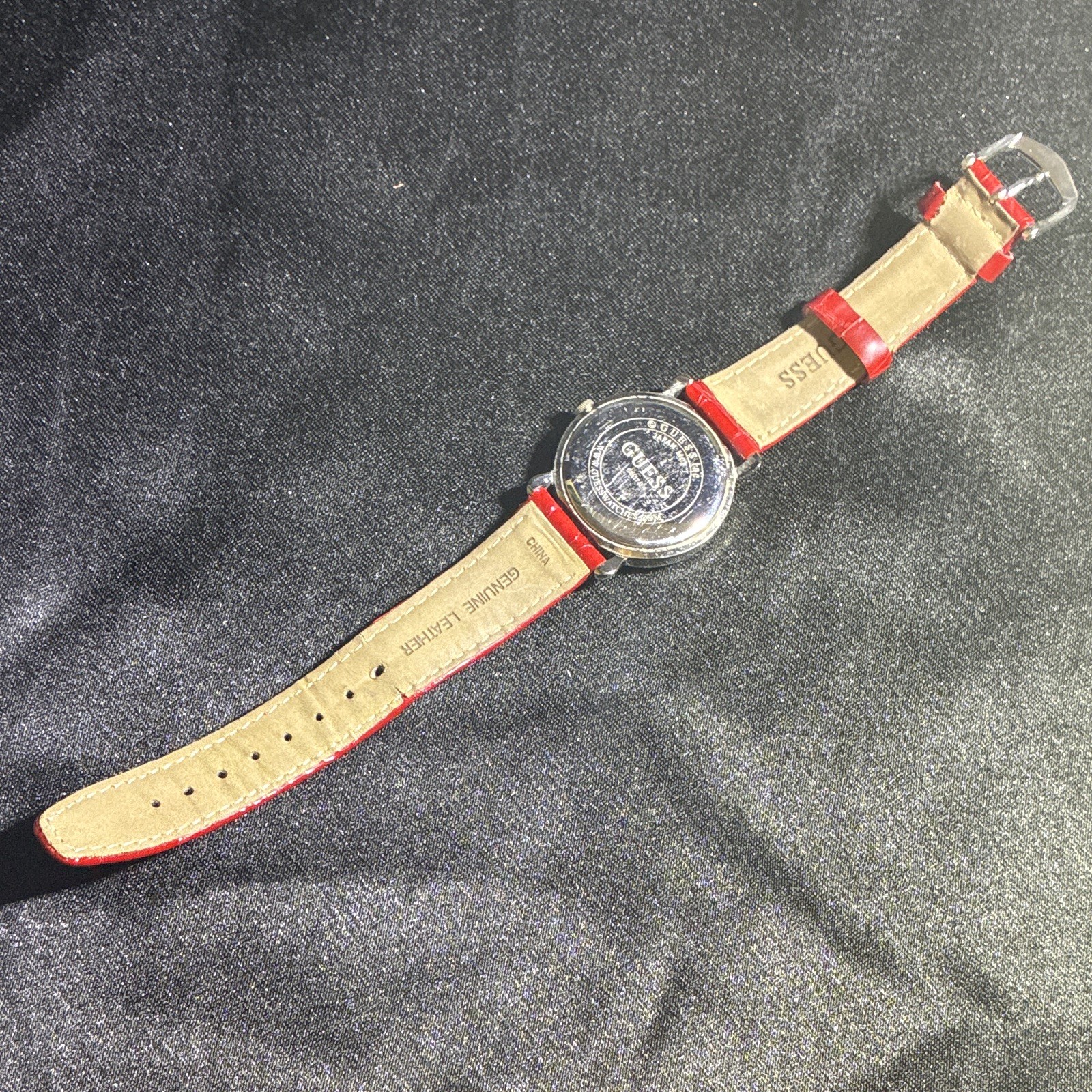 GUESS G65174L Women’s Quartz Analog Watch White Dial Red Leather Strap Day/Date