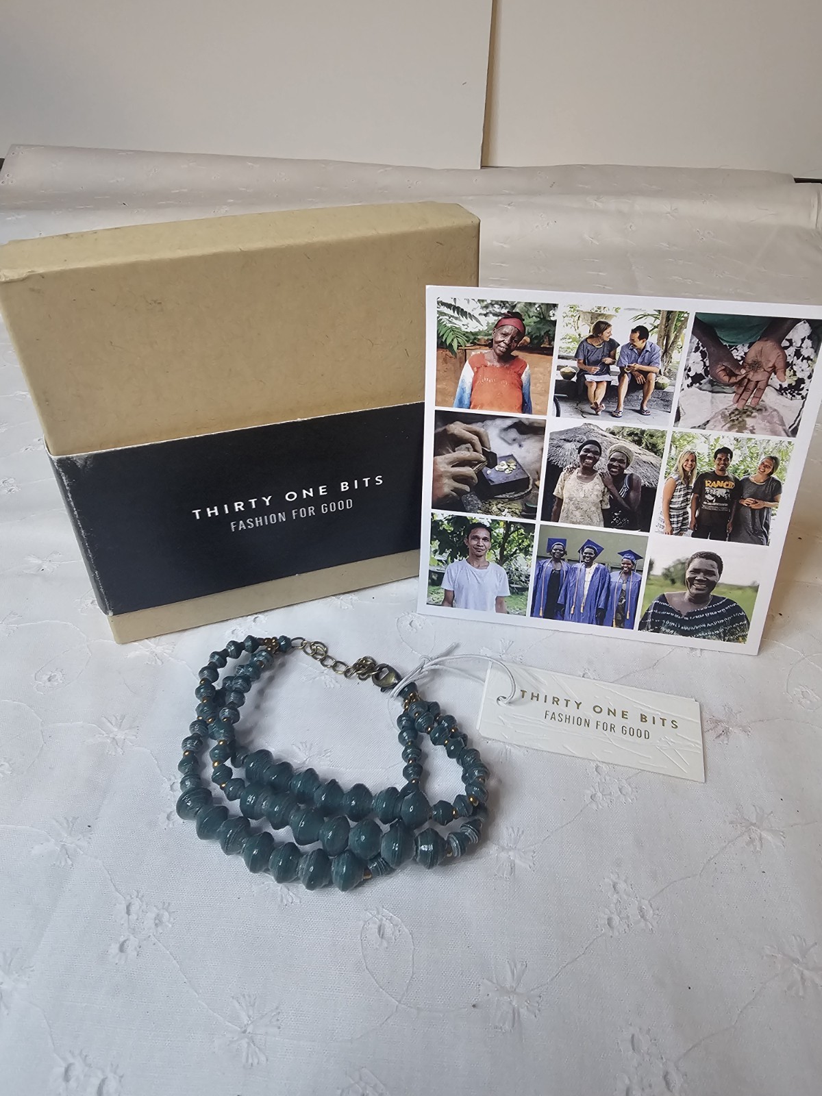 Thirty One Bits multi-strand green paper bead Bracelet Made In Uganda