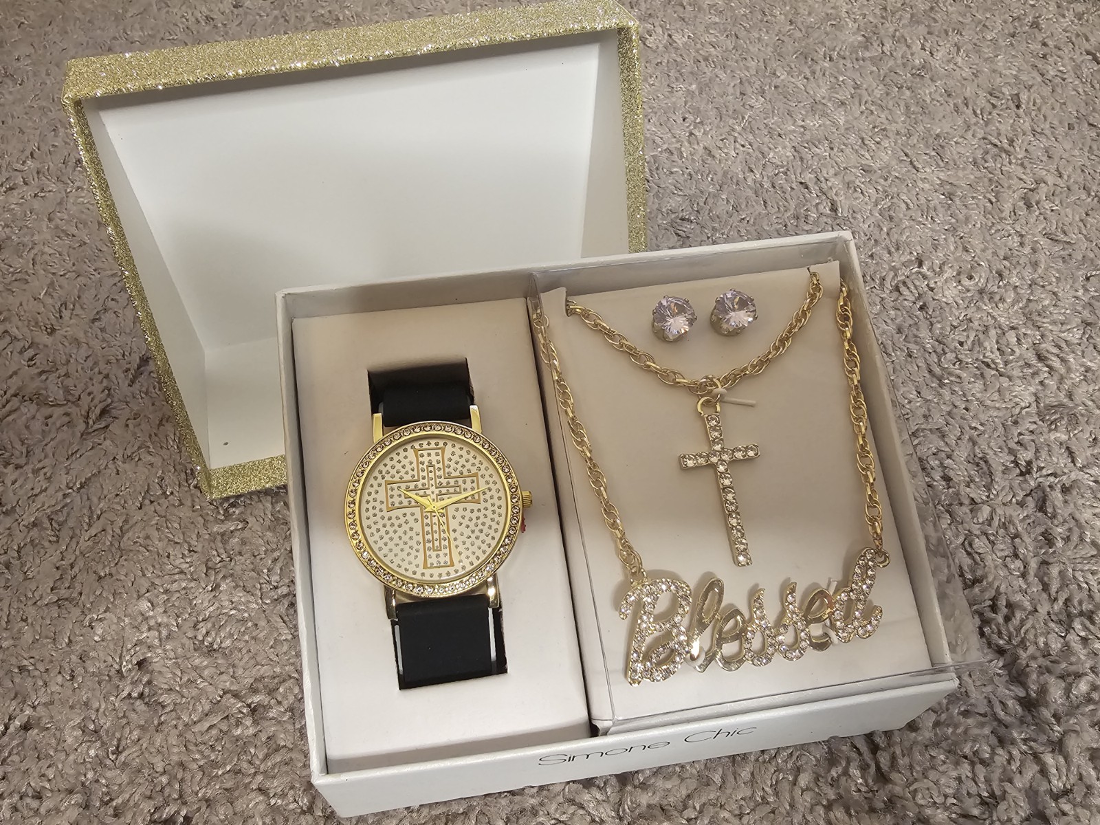 Brand new never been worn. Necklace says blessed, has a watch and earrings.