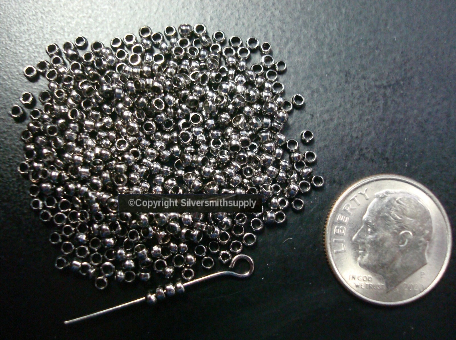 CRIMP BEADS Gunmetal Black plated 2x1mm round crimp beads FPS128B