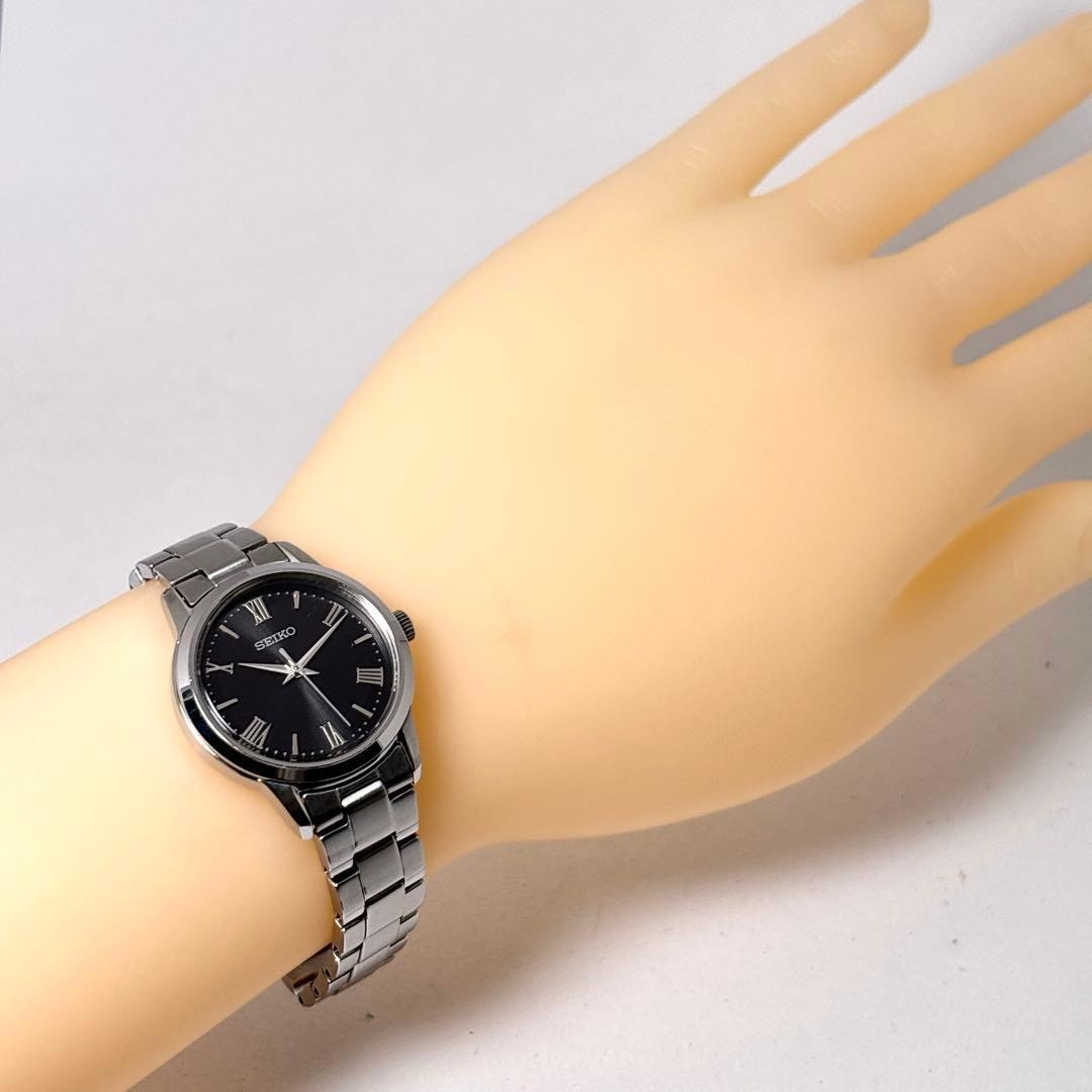 SEIKO V131-0AF0 Solar Ladies Watch Quartz Round Roman Black Dial Stainless Steel