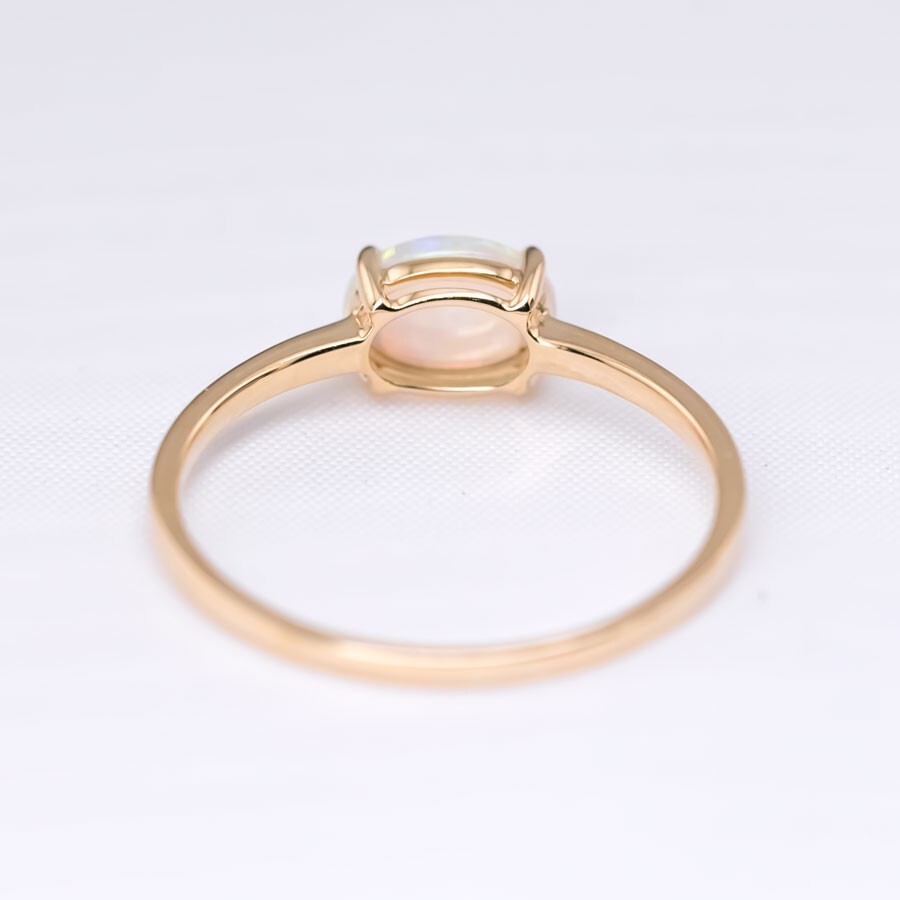 18K Yellow Gold Engagement Ring featuring an Oval Shaped Australian Solid Opal