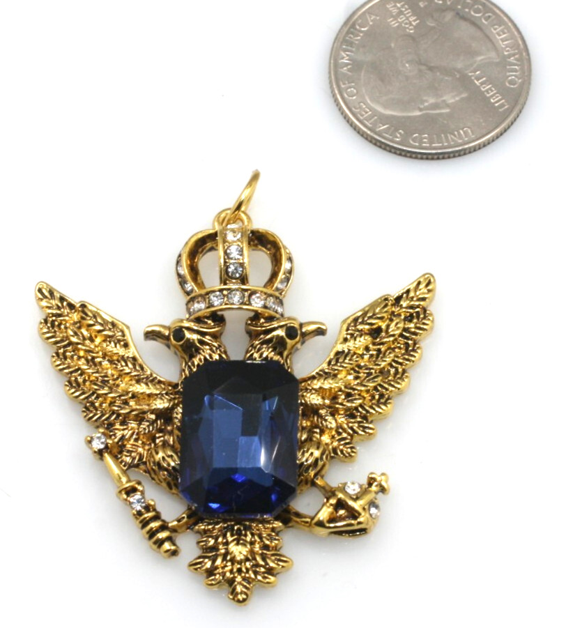Gold tone double eagle crown blue emerald cut stone pendant regal style