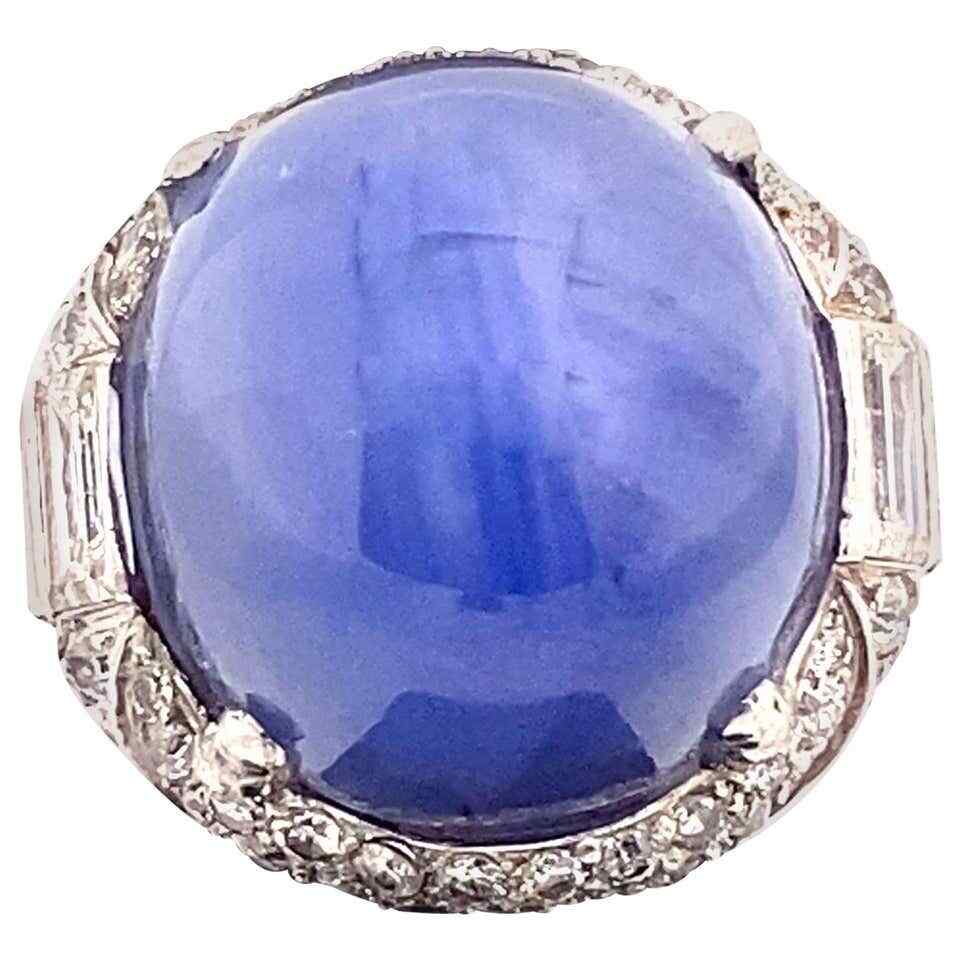Features A Huge 79.80CT Cabochon Ceylon Sapphire With Clear CZ 1920 Vintage Ring