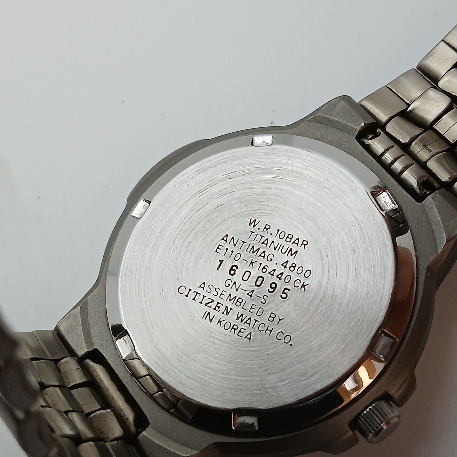 Citizen Eco-Drive Junction Titanium Solar Mens Watch E110-K16440 CK Gray Dial