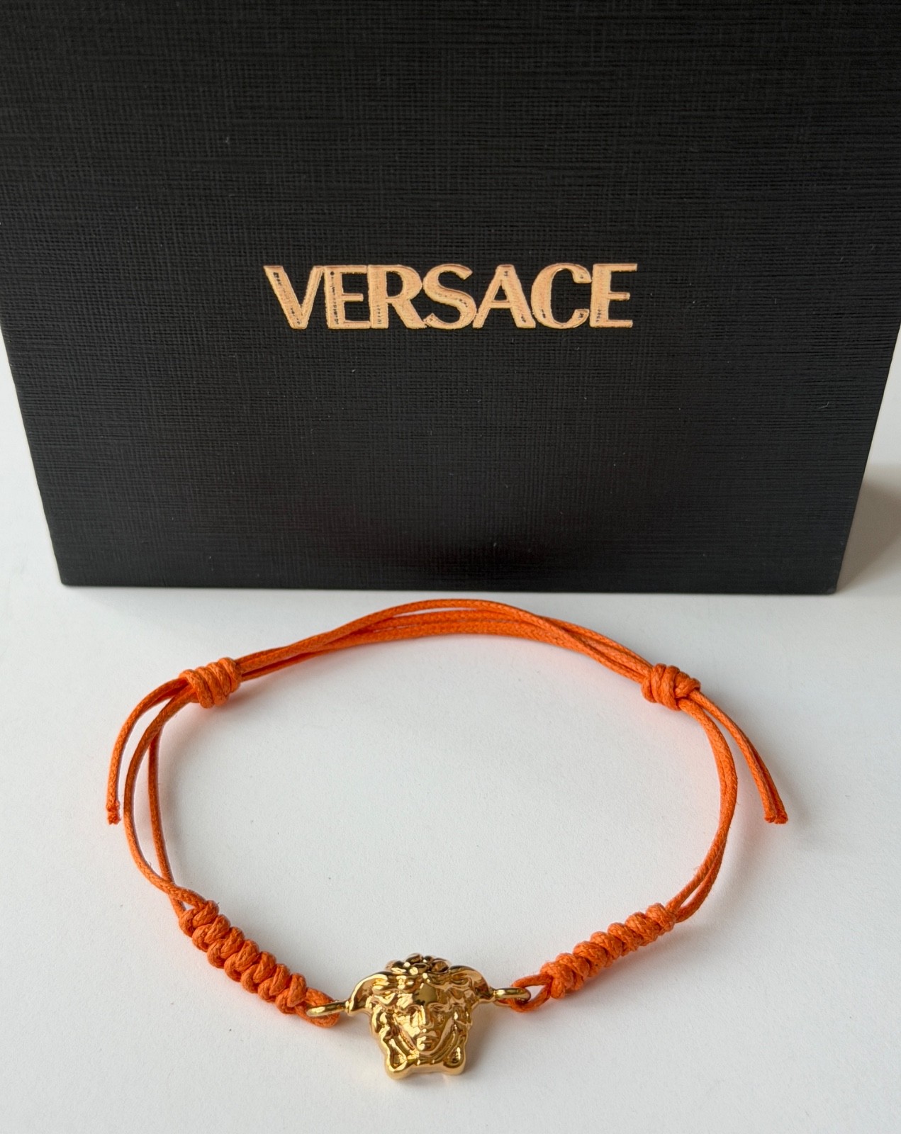 NWT Versace Medusa Head 3D Logo Charm Gold Orange Drawstring Cord Bracelet $495