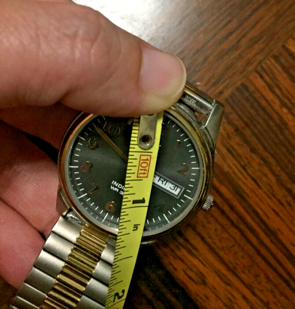 Timex Wristwatch Gold & Silver Tone Expansion Band Black Face Day Date Indicator