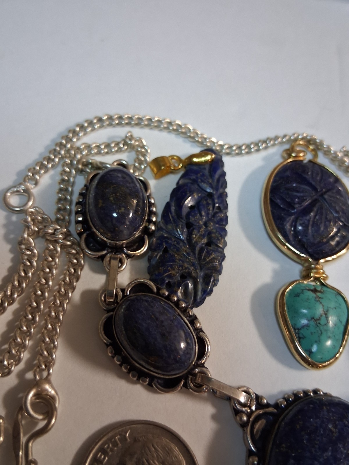 carved lapis lazuli gold filled pendants, sterling silver necklace, total 40g