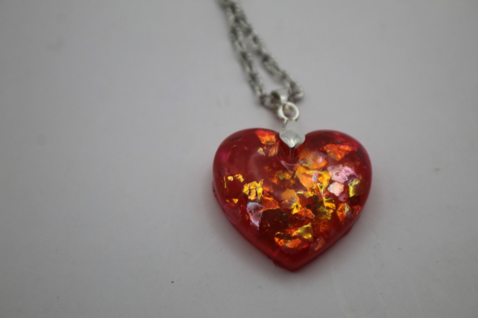 Shiny Red Heart Shaped Resin Pendant On A Chain Necklace With Matching Ring