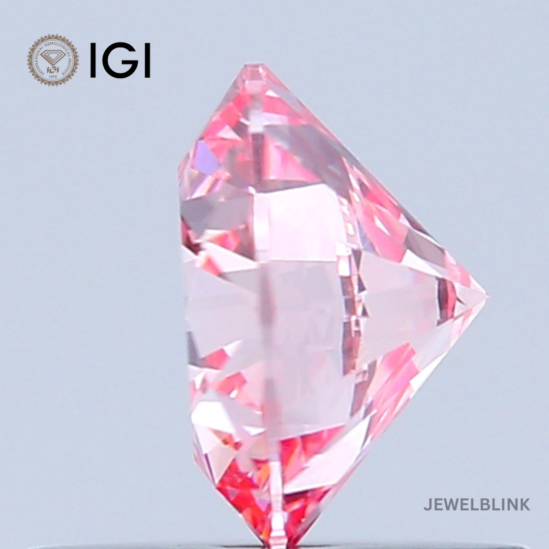 IGI Certified 0.69 Carat Fancy Intense Pink VS1 Round Cut CVD Lab Grown Diamond