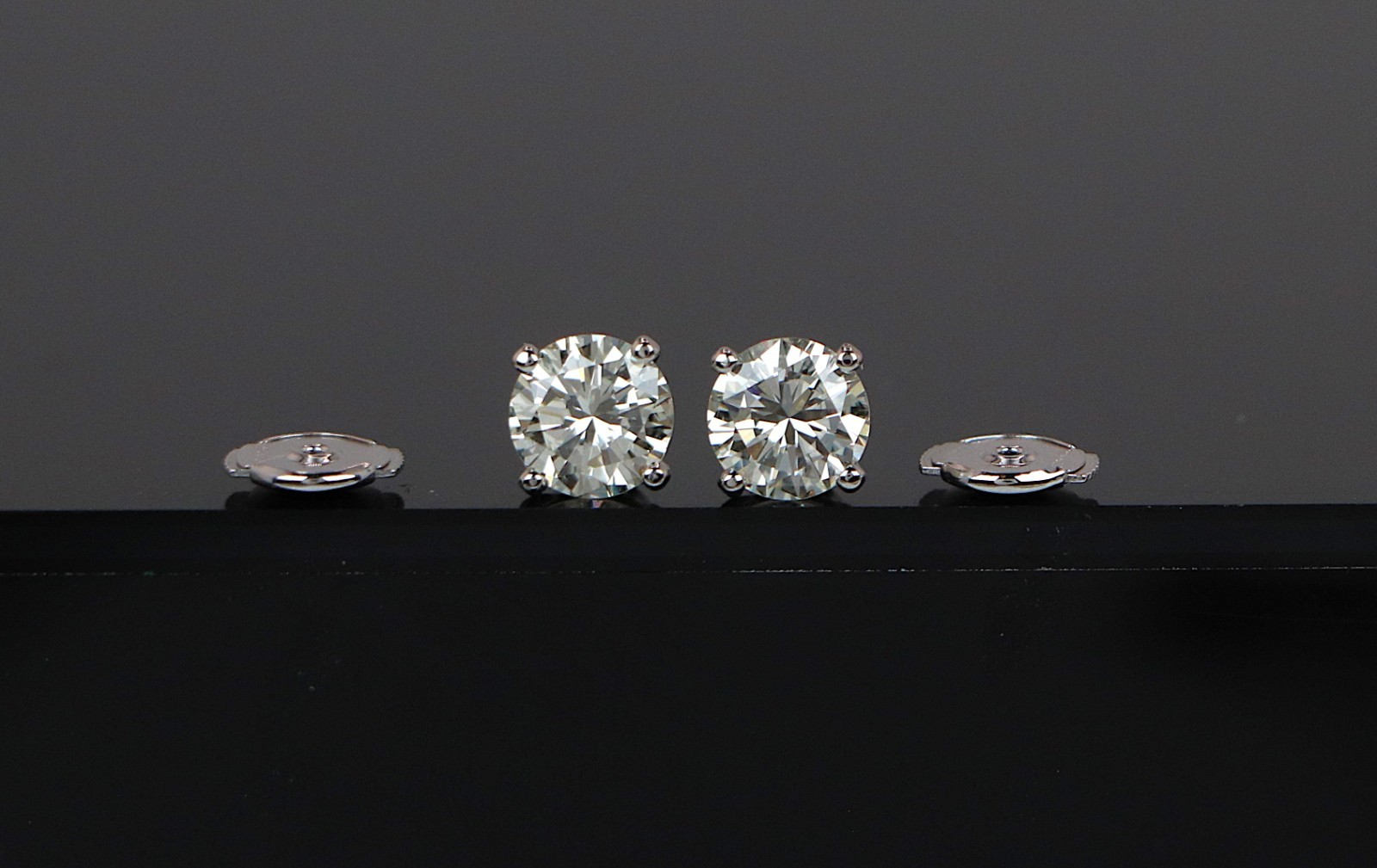 $12,000 Platinum GIA 2.20ct VS1 Round Cut Diamond 4 Prong Basket Stud Earrings