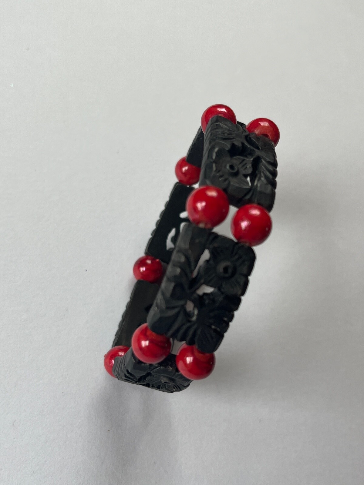 Alternating Carved Black Floral Rectangle & Red Round Plastic Beads Stretch Brac