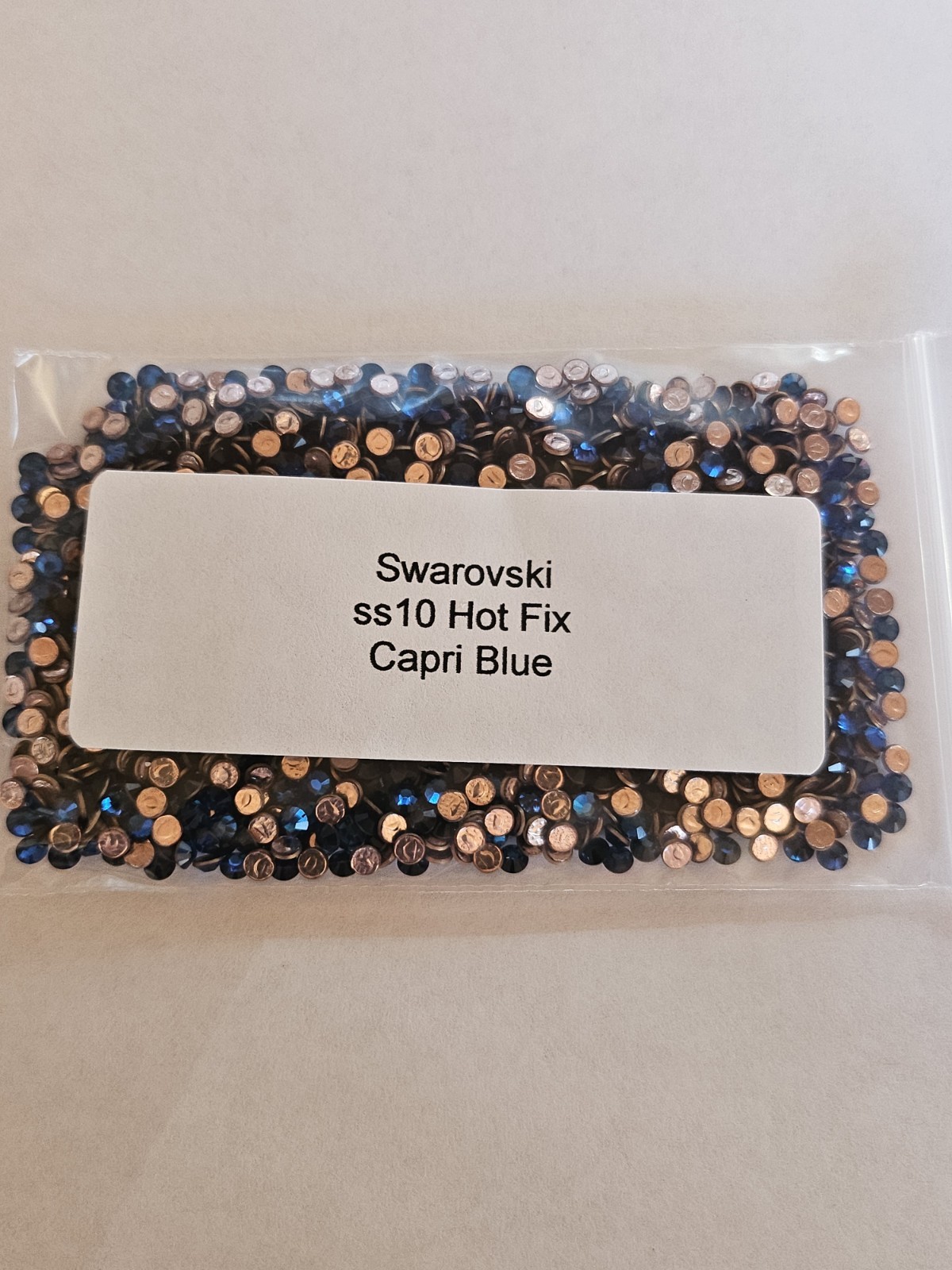 Genuine Swarovski ss10 Hot Fix Crystals in the color LIGHT COLORADO TOPAZ